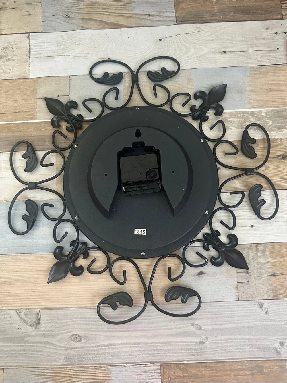 Black Ornate Metal Wall Clock - Decorative Roman Numerals